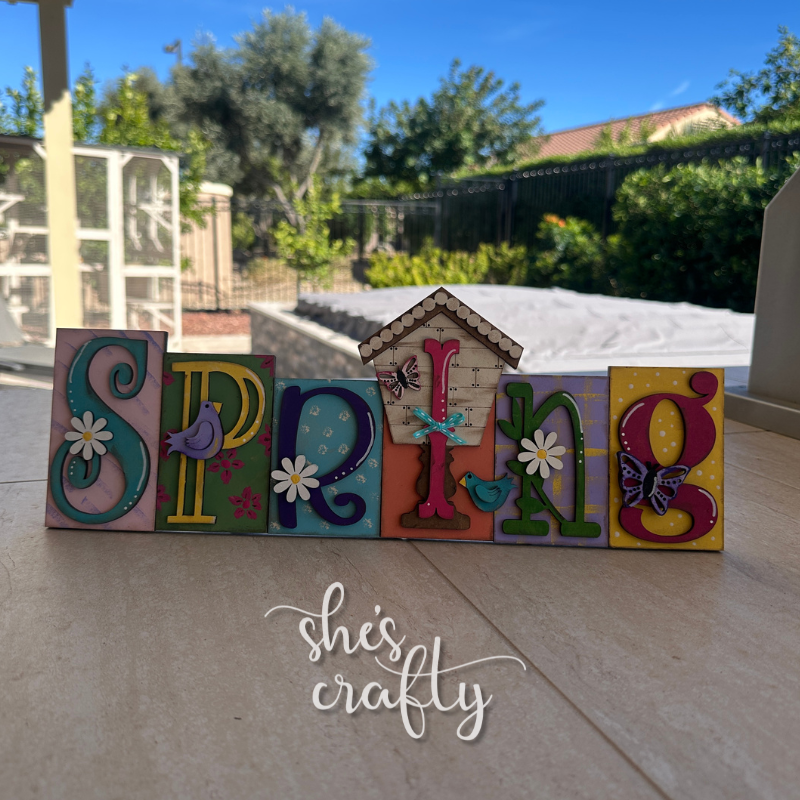 Spring Word Block Shelf Sitter